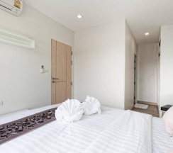 Двухместные апартаменты двуспальная кровать в Happy Place Condo