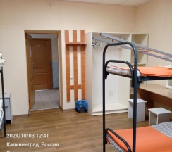 Кровать в общем номере в Порт 55