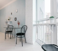 Четырёхместные апартаменты c 1 комнатой с балконом в Апартаменты Light apartment lxt.by