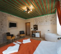 Двухместный люкс двуспальная кровать в La Casa Cave