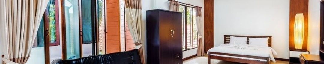 Двухместный полулюкс c 1 комнатой с видом на сад двуспальная кровать в Assada Boutique Hotel Kata Phuket