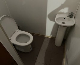 Эконом с раздельными кроватями и общим санузлом в Мотель