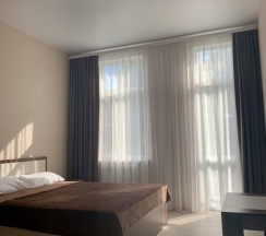 Апартаменты Superior с 3 комнатами с балконом в Гостевой дом с апартаментами