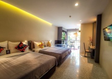 Четырёхместный номер Deluxe в Sino House Phuket Hotel