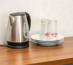 Двухкомнатный номер с одной большой  кроватью в Великий Каспий