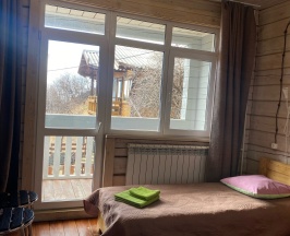 Стандартный двухместный номер с двумя отдельными кроватями (солнечная сторона) в Гавань Листвянка