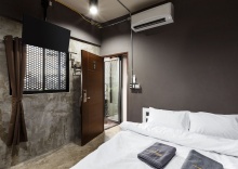 Четырёхместный семейный номер Standard с видом на город в Sleepover Hostel Bangkok