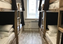 Кровать в 8-местном мужском номере №6 (удобства на этаже) в Hostel 65