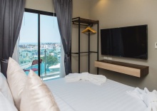 Четырёхместный номер Premium 2 отдельные кровати в Triple L Hotel Patong Beach