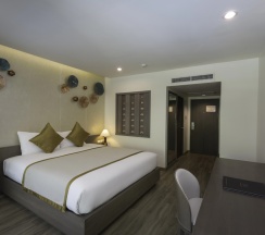 Двухместный номер Deluxe с балконом и с видом на бассейн 2 отдельные кровати в Chanalai Flora Resort, Kata Beach