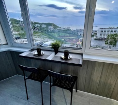 Номер делюкс семейный с 1 односпальной и 1 двуспальной кроватью (с балконом) в Pallada