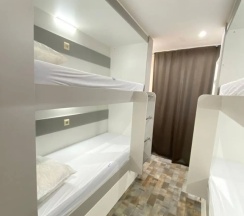 Кровать в общем номере (женский номер) в Арктика