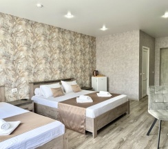 Трехместная комната комфорт в Корнилофф от Травел Хотелс Антураж