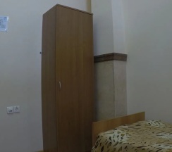 Кровать в общем номере в Гостевой дом