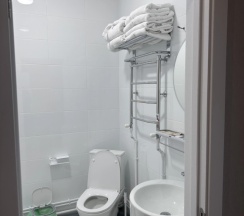 Двухместный номер Стандарт без окна 2 отдельные кровати в В моменте