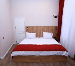 Двухместный номер Deluxe с балконом двуспальная кровать в Malakan Hotel