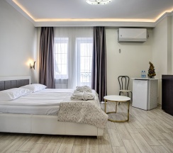 Двухместные апартаменты 10 c 1 комнатой с видом на море двуспальная кровать в Exclusive Hotel&Apartments