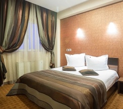 Четырёхместные апартаменты в Inter Business Bucharest Hotel
