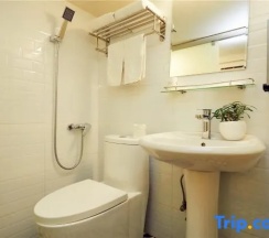 Кровать в общем номере (общая ванная комната) в Meego Qingwen Hotel