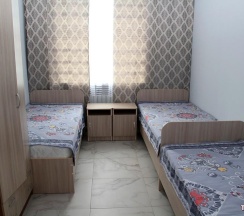 Кровать в 4-местном общем номере в Гостиница