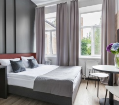 Улучшенный с двуспальной кроватью и мини-кухней в Greenfeel Smolensk