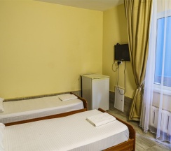 Номер стандарт с 2 односпальными кроватями в Оптима