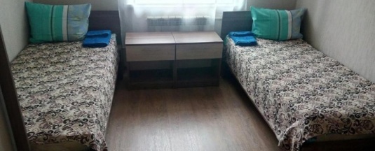 Кровать в общем номере в Уфалей
