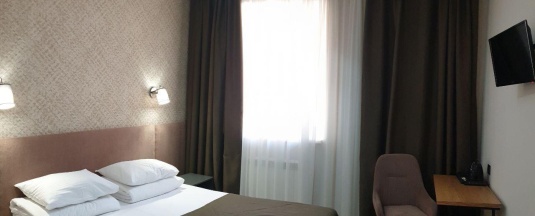 Номер стандарт с 1 двуспальной кроватью в Альпина