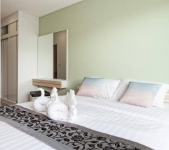 Двухместные апартаменты двуспальная кровать в Happy Place Condo