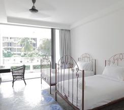 Двухместный номер Deluxe с балконом двуспальная кровать в Surintra Boutique Resort