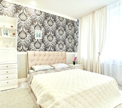 Четырёхместные апартаменты с балконом и с видом на город в Апартаменты Проспект Независимости 52