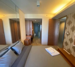 Четырёхместный номер Deluxe с балконом в BoonRumpa Condotel
