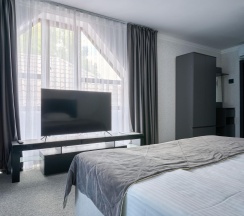 Номер улучшенный комфорт с 1 двуспальной кроватью в Белла