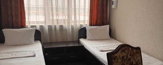 Номер стандарт с 2 односпальными кроватями в Отель-Кавказ