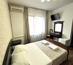 Номер с двуспальной кроватью в Киви