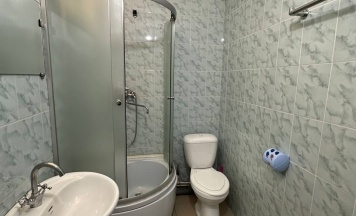 Трехместный номер с 3 односпальными кроватями в Улисс