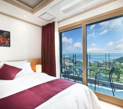 Четырёхместный номер Deluxe двуспальная кровать в Familia Hotel Jeju