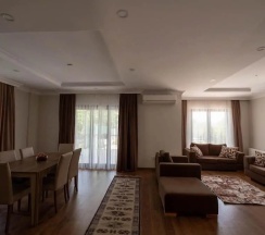 Вилла с 4 комнатами с балконом в Guzel Evler Family Resort