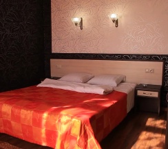 Номер люкс семейный с 1 двуспальной кроватью в Вариант