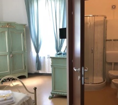 Двухместный номер Standard с видом на сад двуспальная кровать в Relais Puccini