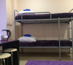 Кровать в 8-местном общем номере в Арт-Хостел