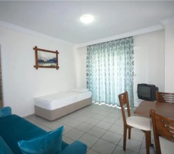 Трёхместные апартаменты c 1 комнатой в Sen Apart