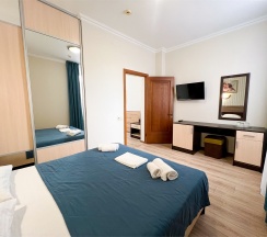 Семейный номер (2x-комнатный 3x-местный номер) в Марко Поло