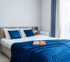 Номер Superior в Квартира на сутки Минск Маяк Метро 3 минуты Бесконтактное заселение Wi-Fi Кухня объединена с жилой зоной Отдельная спальня