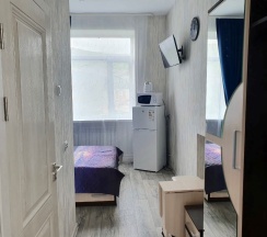 Стандартный номер с полутороспальной кроватью в Советский