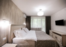 Номер люкс семейный с 1 двуспальной кроватью в Аврора парк отель