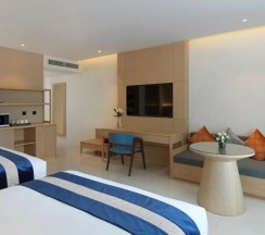 Двухместный номер Grand Deluxe с балконом 2 отдельные кровати в Chanalai Flora Resort, Kata Beach