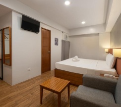 Двухместный номер Deluxe двуспальная кровать в Ihotel Uptown Bgc