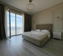 2-комнатные апартаменты люкс премиум с 1 двуспальной кроватью и диваном в Apart Ru Hotel