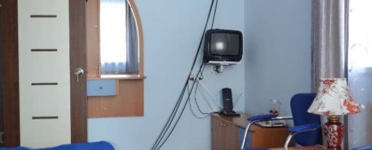 Номер комфорт с 4 односпальными кроватями в Капитал